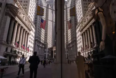 Wall Street points lower after Trump’s weekend tariff announcement; bank earnings this week