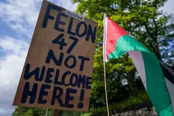 Trump tees off in Scotland as protests, backlash grow