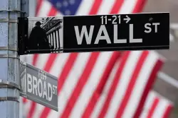 Wall Street steadies itself as Alphabet pulls tech stocks higher
